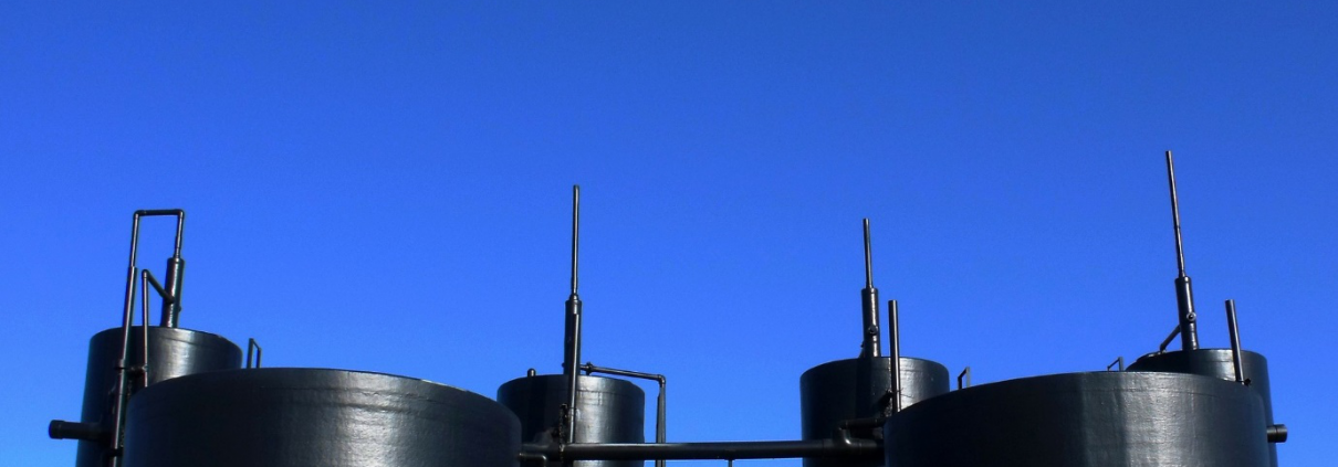 Oil storage tanks at an industrial refinery