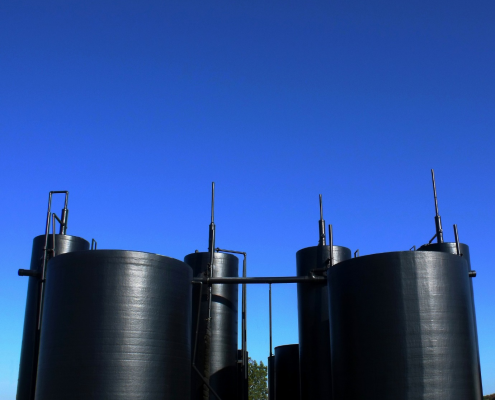 Oil storage tanks at an industrial refinery