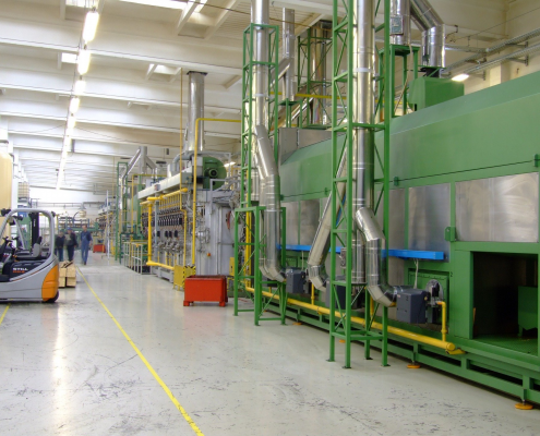 An industrial room with big processing units
